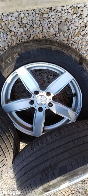  5x120 lyukosztású 17" használt Dezent alufelni, rajta kopott gumi  4. kép