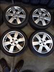 Nissan 4x114.3-as 6x16" használt (gyári felni) alufelni, rajta 185/50 használt Falken nyári gumi Mxx