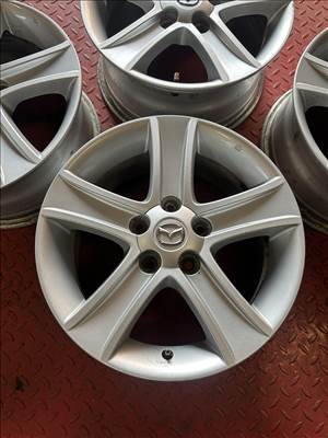  Mazda gyári 5x114,3 7x16" ET55 használt alufelni garnitúra