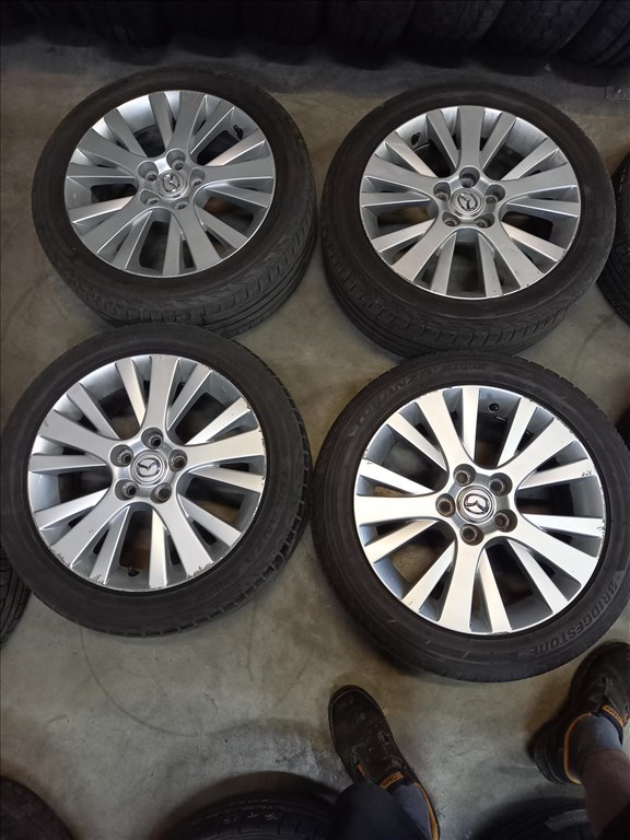  Mazda 5x114.3-as 7x17" újszerű (gyári felni) alufelni, 215/50 használt Bridgestone nyári gumi Mxx 1. kép