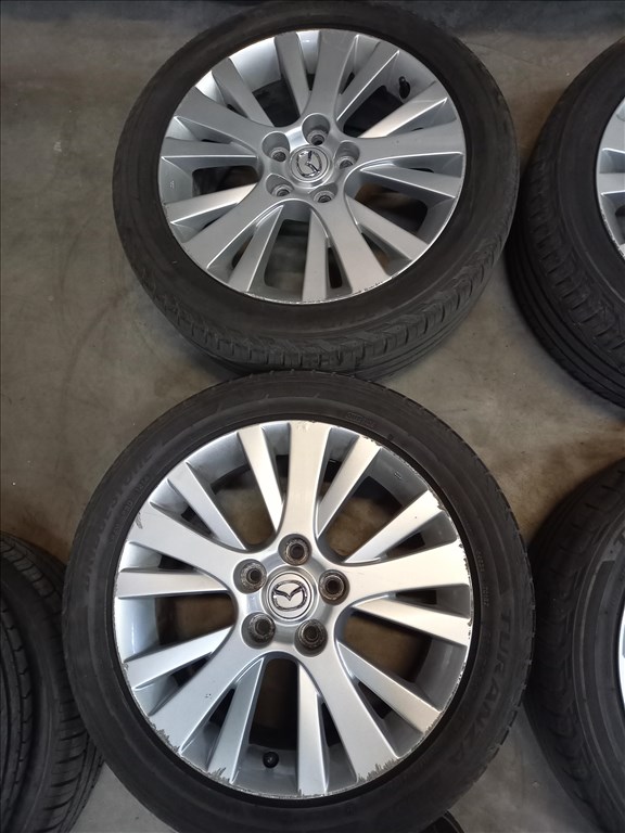  Mazda 5x114.3-as 7x17" újszerű (gyári felni) alufelni, 215/50 használt Bridgestone nyári gumi Mxx 2. kép