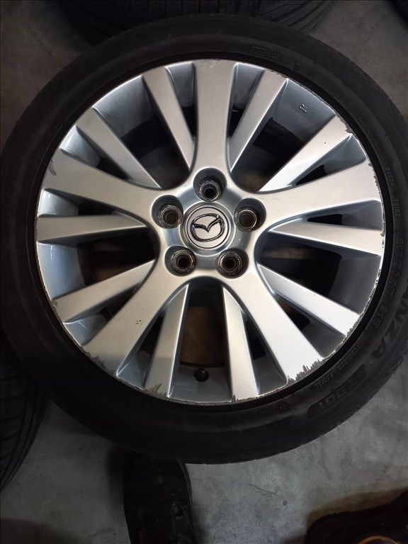  Mazda 5x114.3-as 7x17" újszerű (gyári felni) alufelni, 215/50 használt Bridgestone nyári gumi Mxx 3. kép