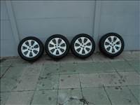 4x100 lyukosztású 16" újszerű (gyári felni) alufelni, rajta 205/55 újszerű Vredestein nyári