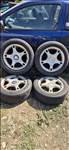  5x100 lyukosztású 16" használt alufelni, rajta 205/55 használt négyévszakos gumi gumi 