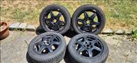 5x100 lyukosztású 15" használt alufelni, rajta 195/50 használt négyévszakos gumi gumi 