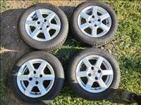 Mitsubishi Colt 4x114.3 lyukosztású 14" használt Aluett alufelni, 175/65 használt Hankook nyári gumi