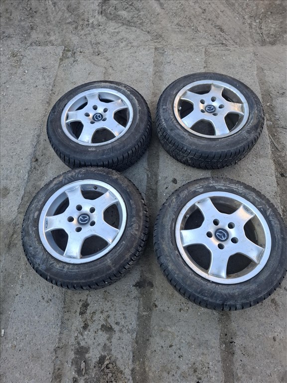  5x108 lyukosztású 15" használt alufelni, rajta 185/65 használt téli gumi gumi  1. kép