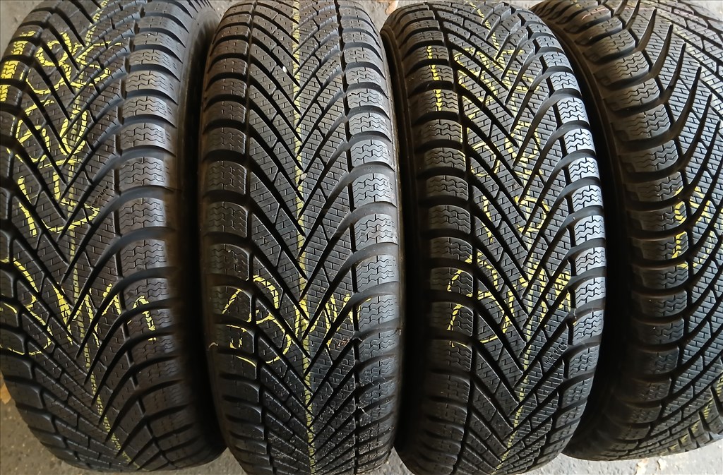  VW Polo 5x100 15" új gyári felni, rajta 185/60R15 újszerű Pirelli 8mm téli gumikkal 2. kép