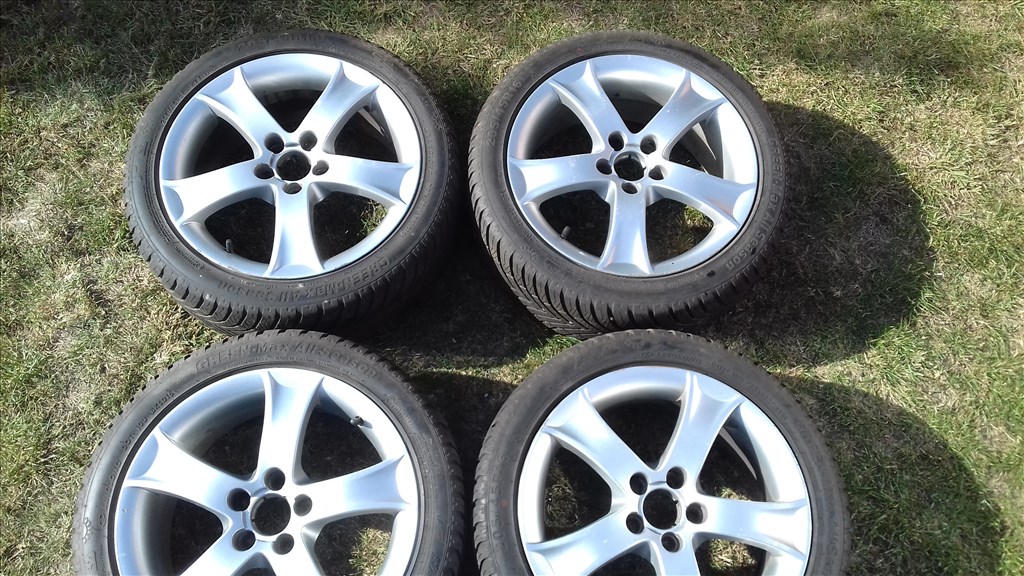  5x100 osztású 6,5J 16" használt (gyári felni) alufelni Vw Seat Skoda 205/45 négyévszakos gumikkal 1. kép