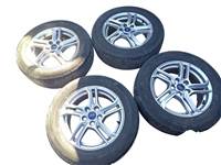  16" használt (gyári felni) alufelni, rajta eldobós gumi Ford focus mk4 