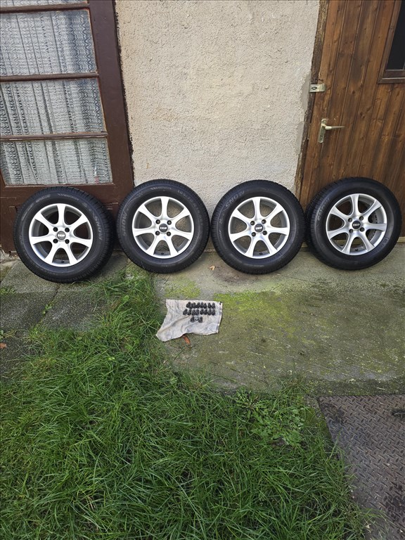  4x100 lyukosztású 14" újszerű RC alufelni, rajta 185/70 újszerű téli gumi!!! 1. kép