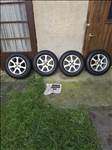 4x100 lyukosztású 14" újszerű RC alufelni, rajta 185/70 újszerű téli gumi!!!