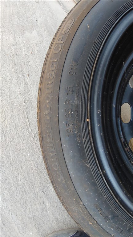   új (gyári felni) lemezfelni, rajta 195/65R15 új Continental nyári gumi  5. kép