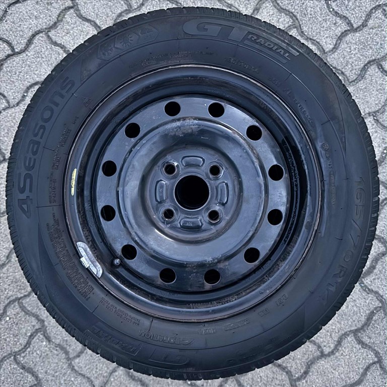 165/70R14 szinte új négyévszakos gumik, gyári Suzuki lemezfelnin! 1. kép