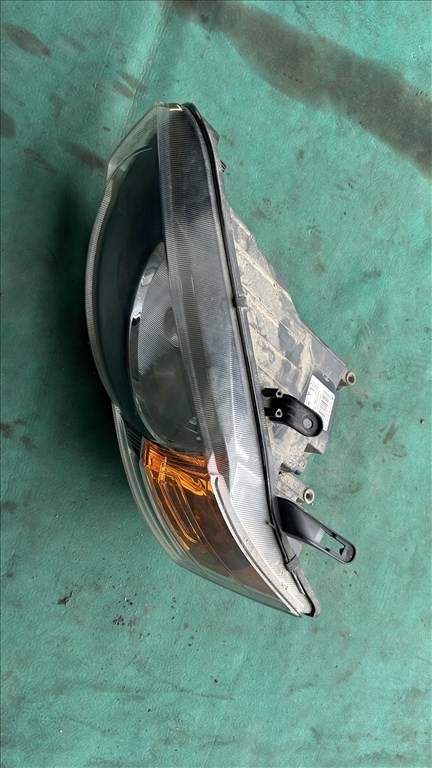 Mitsubishi Colt VI 1.1 Bal első fényszóró  030124930100 1. kép