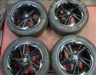 5x108 7,5x19 ET46 újszerű gyári alufelnik 255/50R19 használt téli Continental gumikkal