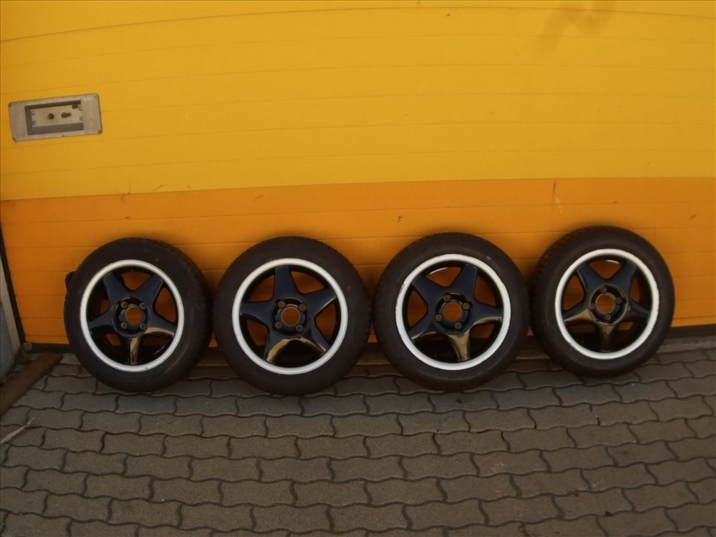  4x100 lyukosztású 14" használt Titan alufelni, rajta 165/60 használt Firestone nyári gumi gumi  1. kép