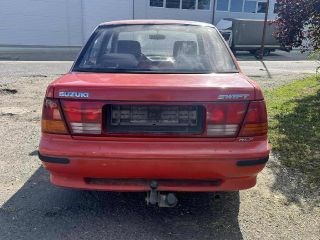 SUZUKI SWIFT II lépcsőshátú (AH, AJ) Jobb hátsó Dobbetét (Kerékjárati, Műanyag) 3. kép