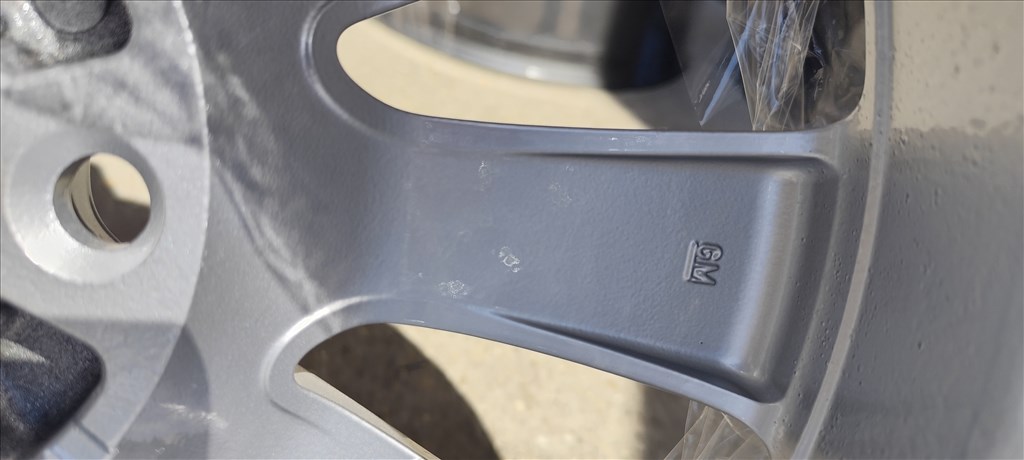 5x115 Opel gyári 17" alufelni garnitúra, ET44, 7J. FRISSEN SZINTEREZETT EZÜST 6. kép