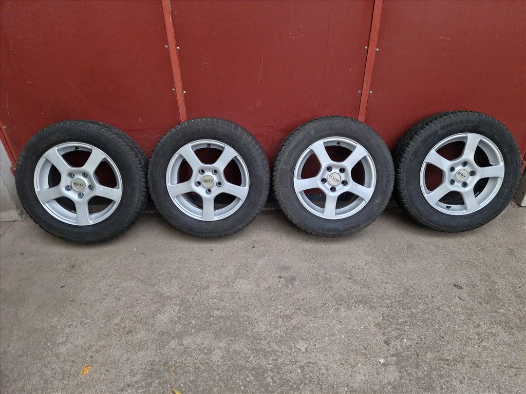  5x110 lyukosztású 15" újszerű alufelni, rajta 195/65 használt Continental téli gumi gumi  1. kép
