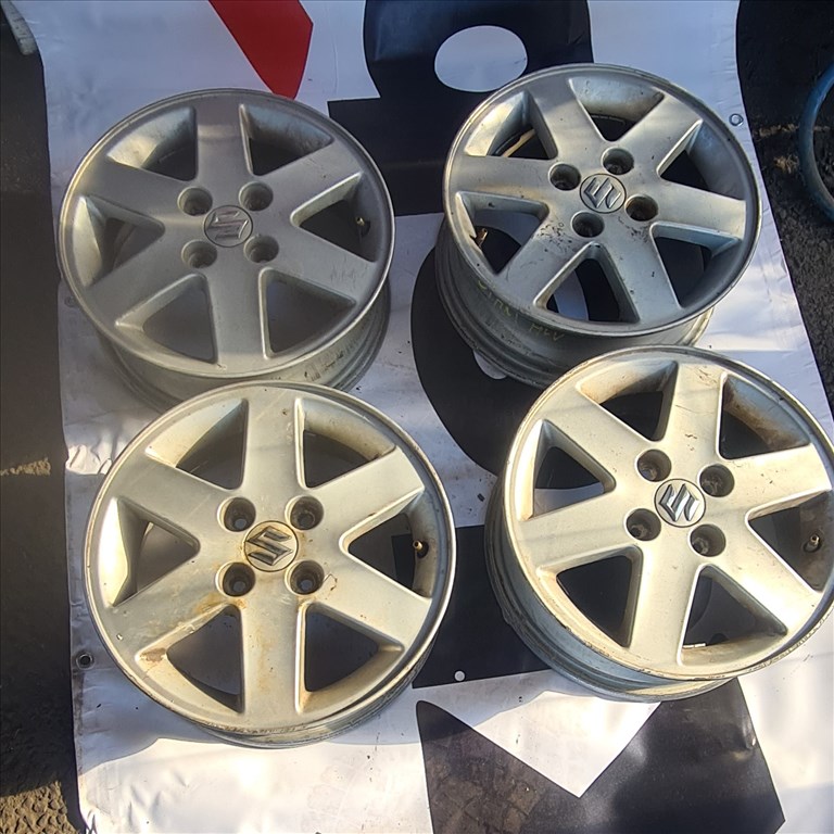  4x100 lyukosztású 5J 14" használt (gyári felni) alufelni 1. kép