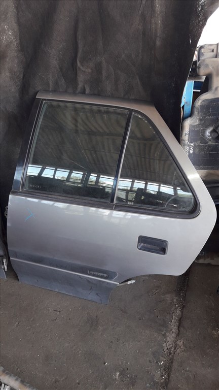 Suzuki Swift II 96-03 Bal Hátsó Ajtó 1. kép