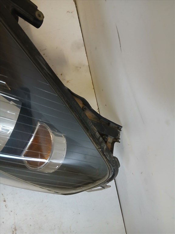 14448 Opel Astra H 2004-2010 Bal első Lámpa Fényszóró  a képen látható sérüléssel 1EG270370-01 4. kép