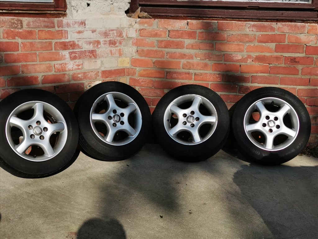  4x100 lyukosztású 14" használt Alessio alufelni, rajta 185/60 használt Continental nyári gumi gumi  1. kép