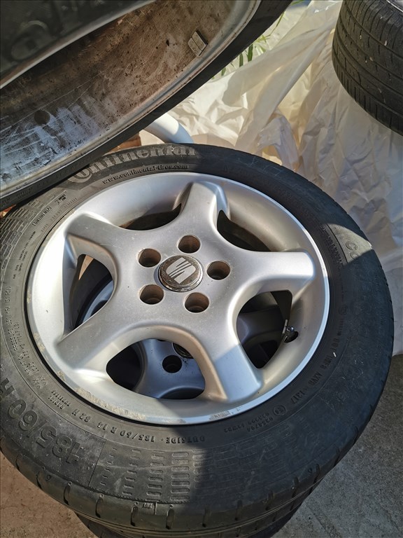  4x100 lyukosztású 14" használt Alessio alufelni, rajta 185/60 használt Continental nyári gumi gumi  2. kép