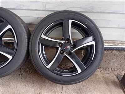  5x100 lyukosztású 16" használt Alutec alufelni, rajta 185/55 új Yokohama nyári gumi