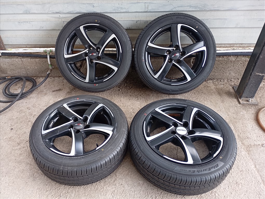  5x100 lyukosztású 16" használt Alutec alufelni, rajta 185/55 új Yokohama nyári gumi 2. kép