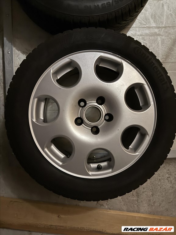  AUDI gyári 7*16" alufelni 205/55R16 91T használt Continental téli gumival eladó 5. kép