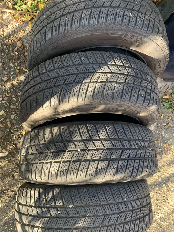  5x110 lyukosztású 16" használt (gyári felni) lemezfelni, rajta 205/55 használt téli gumi gumi  1. kép