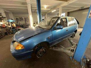 SUZUKI SWIFT II Ferdehátú (EA, MA) Bal első Féknyereg Munkahengerrel