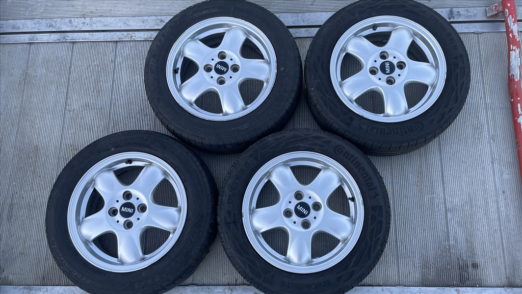  4x100 15 Mini gyári alufelnik 1515001 6769404 6768498 175/65 használt Continental nyári gumi 1. kép