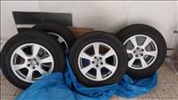  5x108 lyukosztású 17" használt Volvo alufelni, 235/65 használt Hankook téli gumi