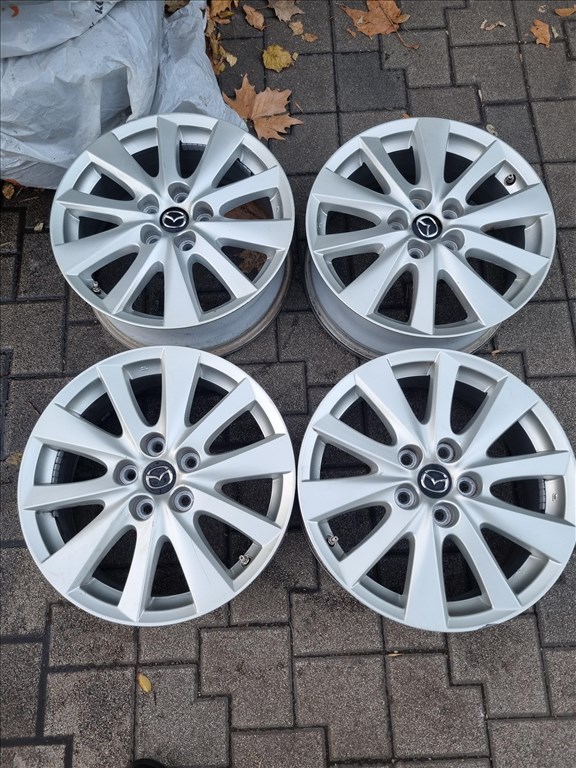  5x114.3 lyukosztású 7JJ 17" újszerű gyári Mazda alufelni 1. kép