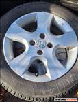  4x100 lyukosztású 15" használt (gyári felni) alufelni, rajta 175/65 használt Kleber téli gumi gumi 