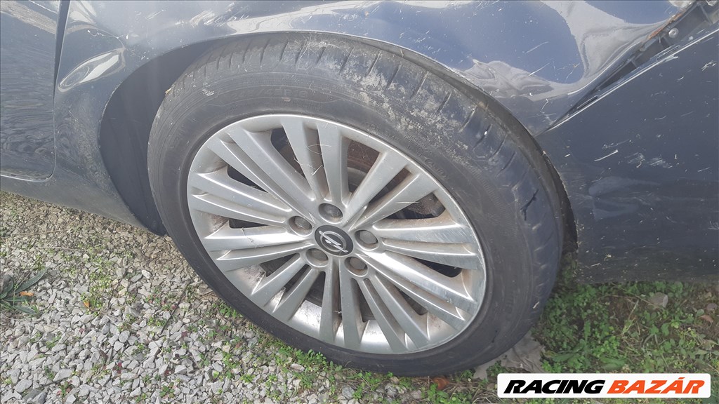  Opel Insignia A 1.6 T sport fenik: 245/45 R18 96W használt Hankook nyári gumik, 1 felni sérült 9. kép