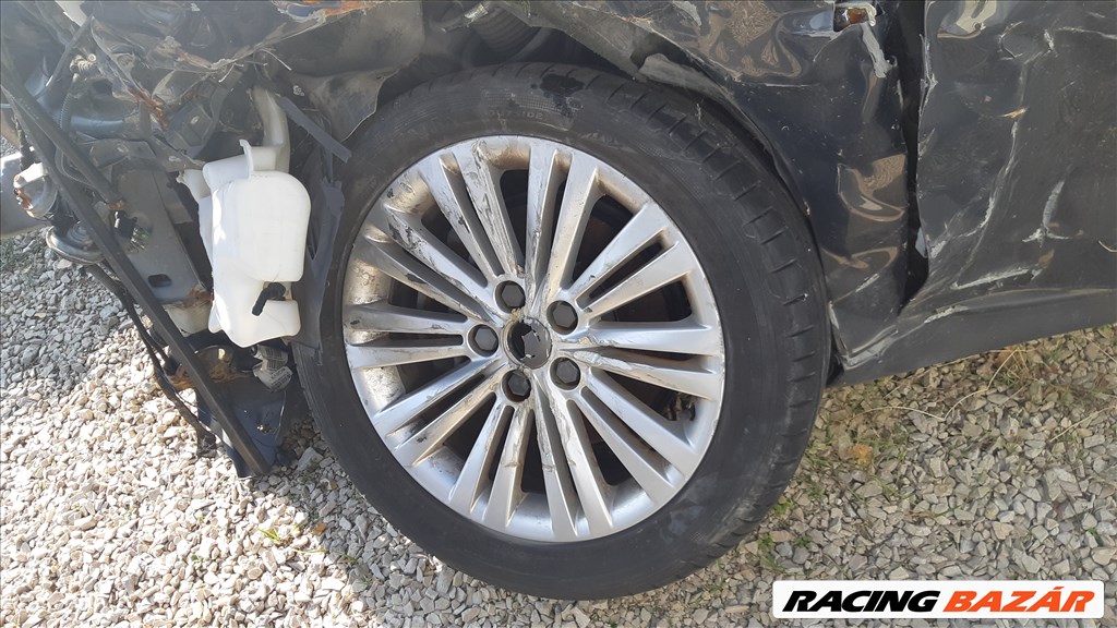  Opel Insignia A 1.6 T sport fenik: 245/45 R18 96W használt Hankook nyári gumik, 1 felni sérült 10. kép