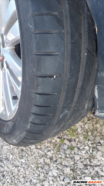  Opel Insignia A 1.6 T sport fenik: 245/45 R18 96W használt Hankook nyári gumik, 1 felni sérült 12. kép