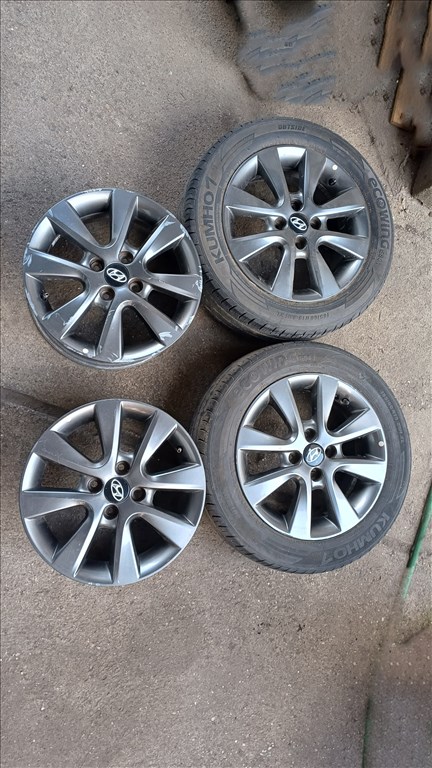  4x100 lyukosztású 15" használt (gyári felni) alufelni, rajta használt Kumho nyári gumi gumi  1. kép