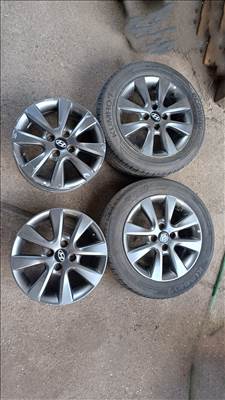  4x100 lyukosztású 15" használt (gyári felni) alufelni, rajta használt Kumho nyári gumi gumi 