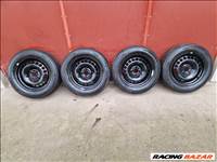  4x100 lyukosztású 15" újszerű gyári lemezfelni, rajta 185/65 használt nyári gumi 