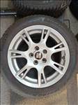  5x100 lyukosztású 15" újszerű (gyári felni) alufelni, rajta 185/60 újszerű Pirelli téli gumi gumi 