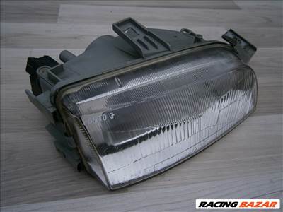 Fiat Punto I jobb fényszóró 301142622 /Hella