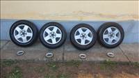  5x100 lyukosztású 15" újszerű alufelni, rajta 195/65 használt nyári gumi gumi 