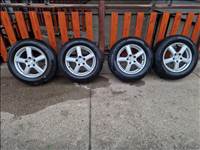  5x114.3 lyukosztású 16" használt Enzo alufelni, rajta 215/65 kopott téli gumi