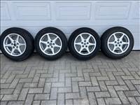  5x112 lyukosztású 15" újszerű alufelni, rajta 195/65 újszerű Hankook téli gumi gumi 