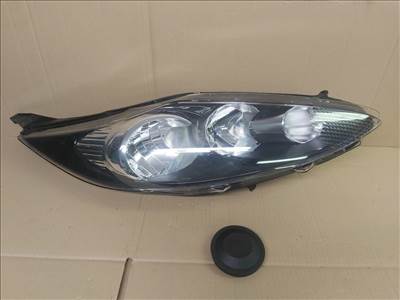 Ford Fiesta 2008-2013  utángyártott, új Fényszóró H1/H7 jobb, fekete h. (motorral) TYC 1678062